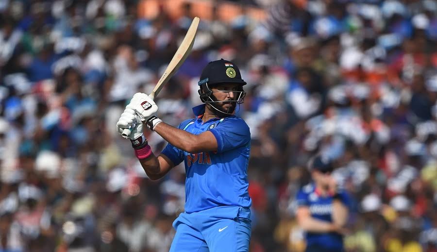India's Yuvraj Singh plays a shot during the second One Day International cricket match between India and England at the Barabati Stadium in Cuttack on January 19, 2017.----IMAGE RESTRICTED TO EDITORIAL USE - STRICTLY NO COMMERCIAL USE----- / GETTYOUT / AFP PHOTO / Money SHARMA / ----IMAGE RESTRICTED TO EDITORIAL USE - STRICTLY NO COMMERCIAL USE----- / GETTYOUT