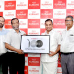Hibi Eden M.P releasing the new logo of Kurians Opticals.