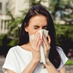 girl-sneezing-cold